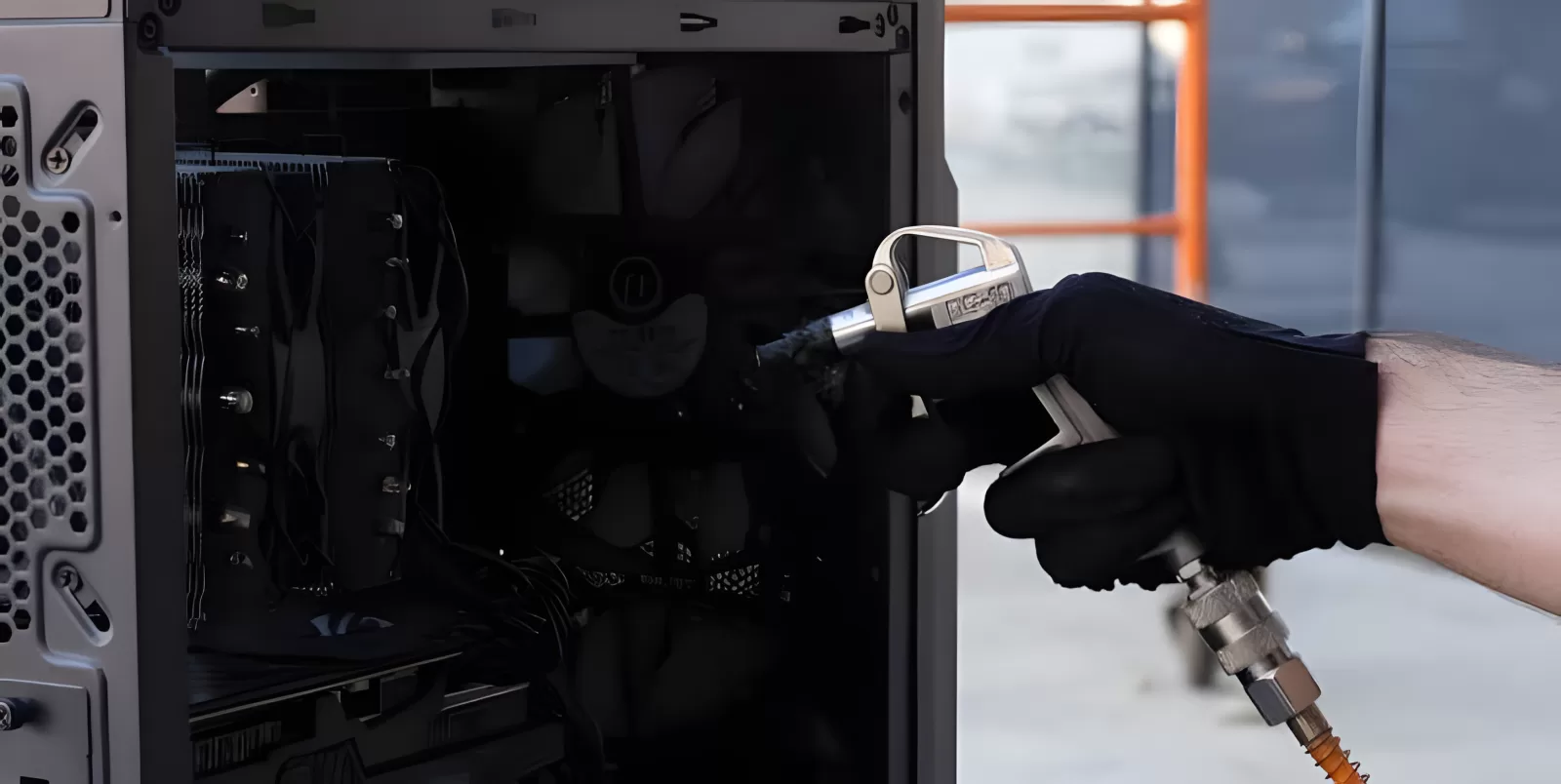 Cleaning dust out of a desktop PC with compressed air